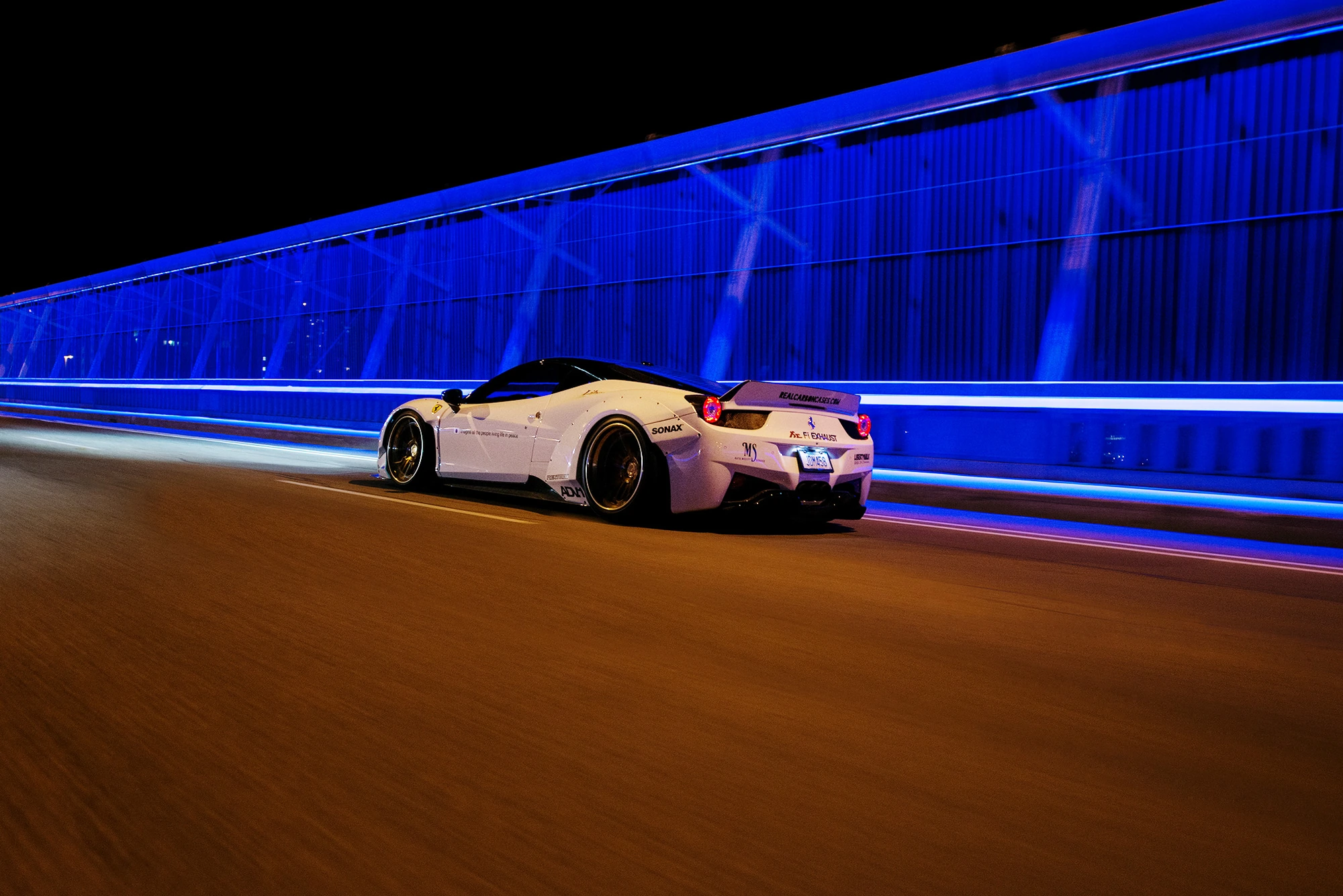 Vibrant night roller shot with bold blue lighting for dynamic media campaigns
